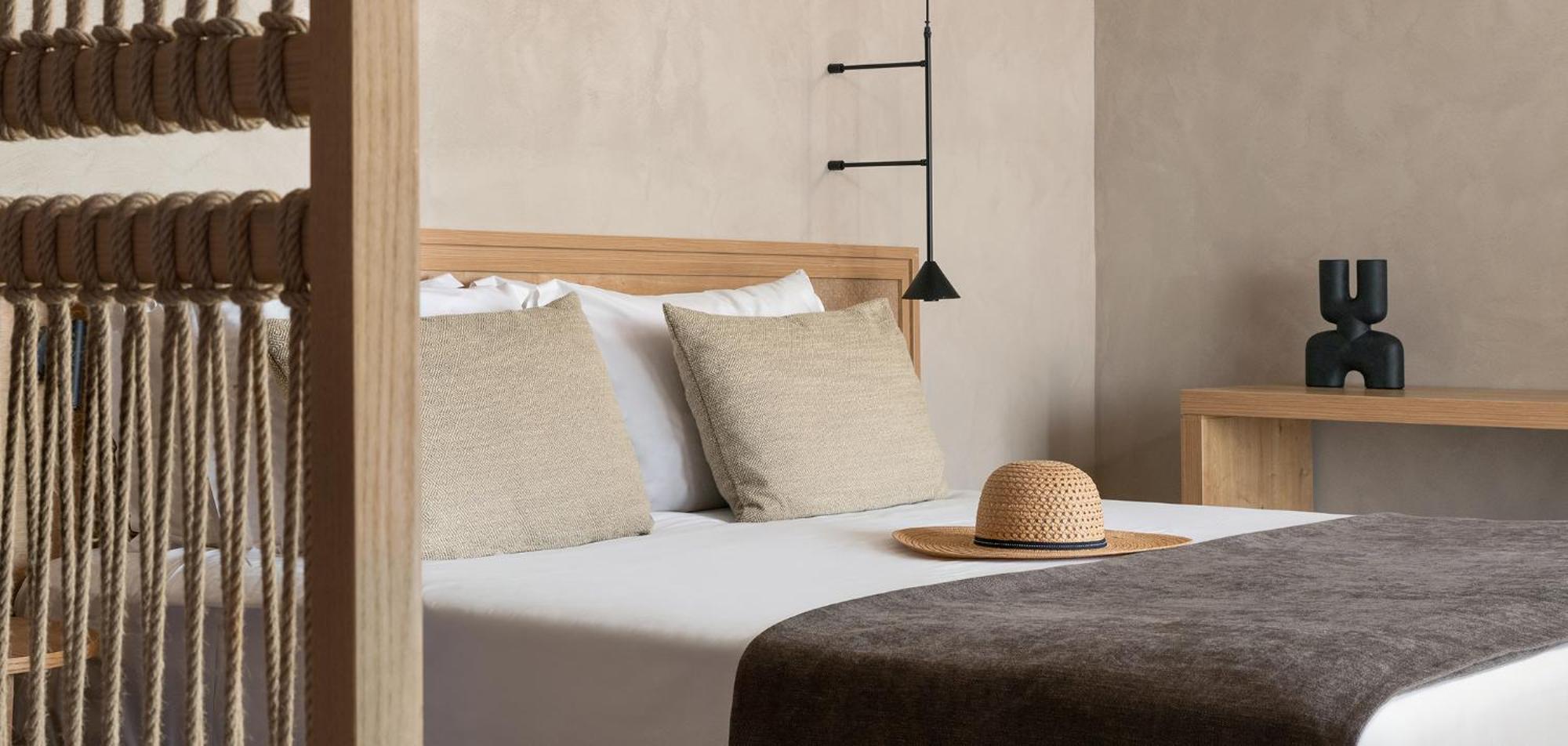 Helea Lifestyle Beach Resort Kallithéa Dış mekan fotoğraf A bed with a straw hat